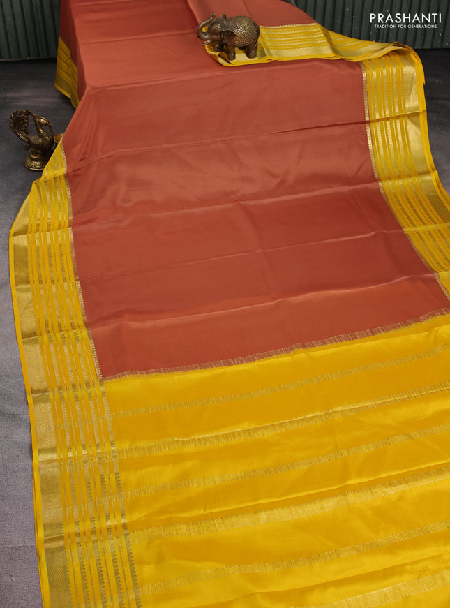 Pure mysore silk saree rust shade and yellow with plain body and long zari woven border
