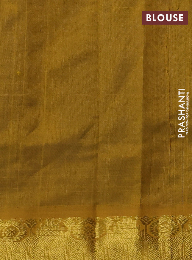 Silk cotton saree peacock green and dark mustard with allover zari woven buttas and zari woven border