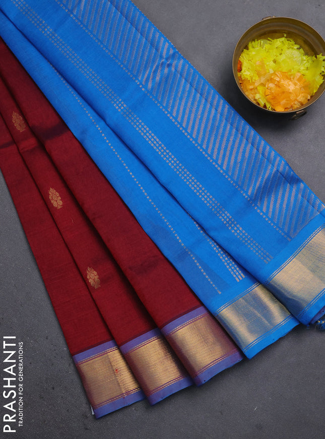 Silk cotton saree maroon and cs blue with allover zari woven buttas and zari woven border