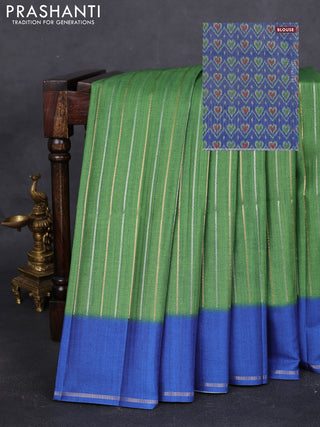 Semi tussar saree green and blue with allover silver & gold zari weaves and simple zari border