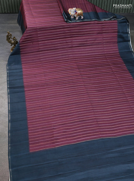 Semi tussar saree deep maroon and dark peacock green with allover silver & gold zari weaves and simple zari border