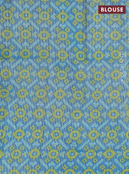 Semi tussar saree light green and peacock blue with allover silver & gold zari weaves and simple zari border
