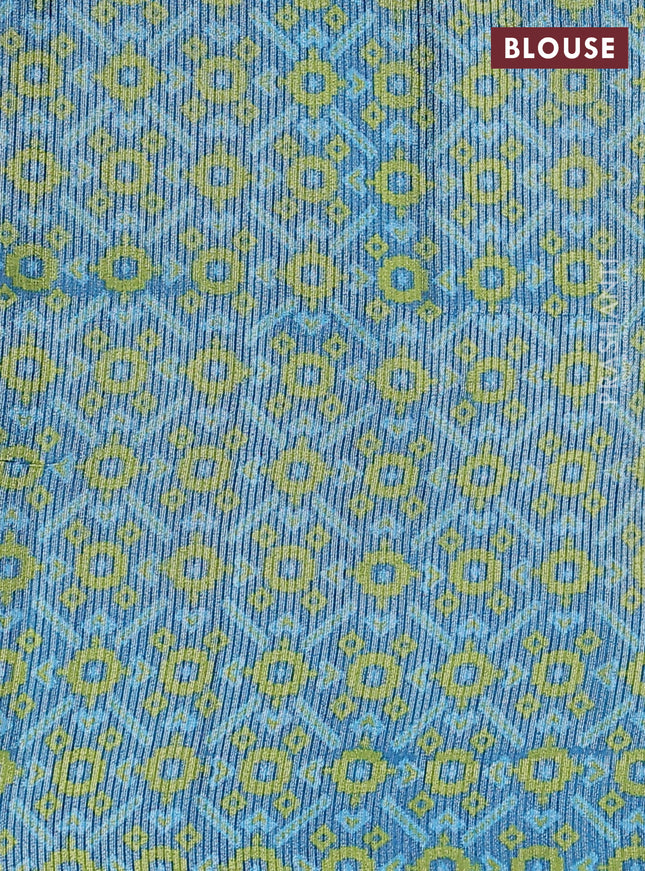 Semi tussar saree light green and peacock blue with allover silver & gold zari weaves and simple zari border