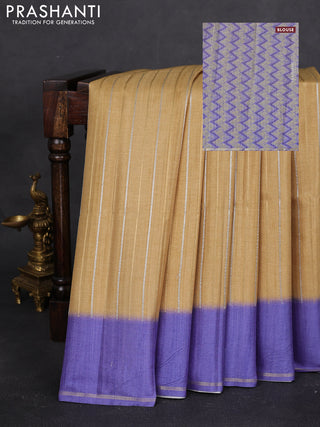 Semi tussar saree sandal and violet with allover silver & gold zari weaves and simple zari border