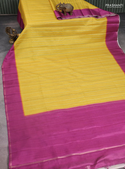 Semi tussar saree mustard yellow and magenta pink with allover silver & gold zari weaves and simple zari border