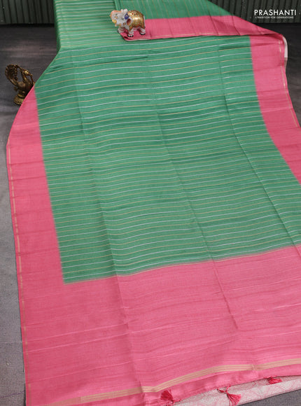 Semi tussar saree green and peach pink with allover silver & gold zari weaves and simple zari border
