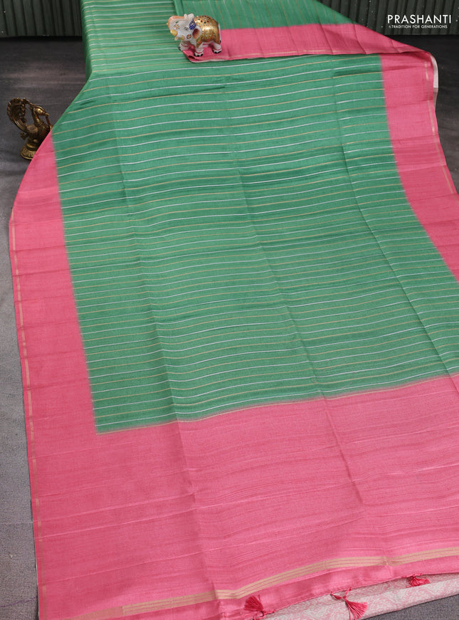 Semi tussar saree green and peach pink with allover silver & gold zari weaves and simple zari border