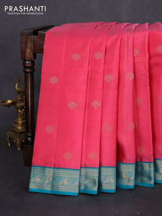 Pure kanchipuram silk saree pink and teal green with floral zari woven buttas and zari woven korvai border