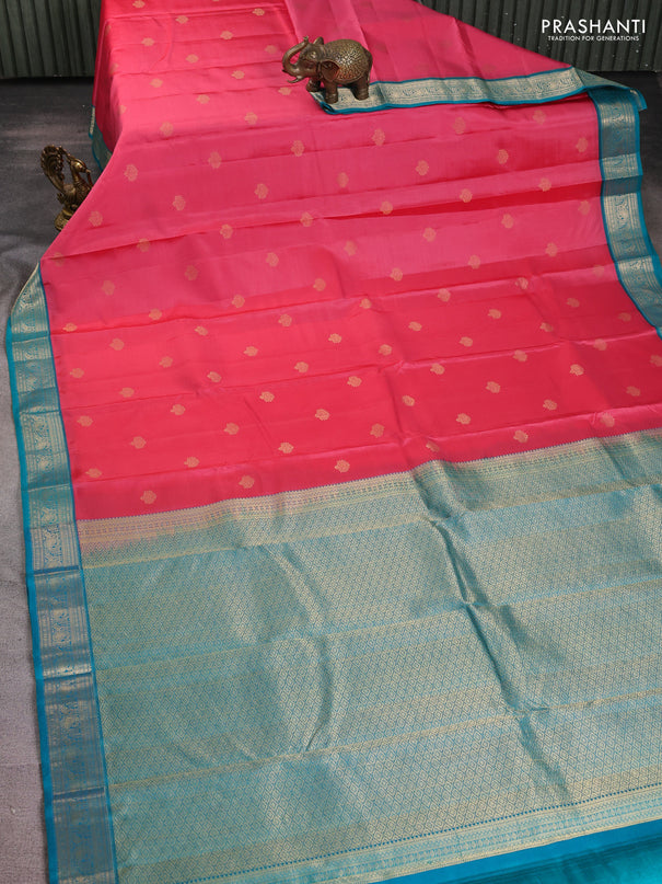 Pure kanchipuram silk saree pink and teal green with floral zari woven buttas and zari woven korvai border