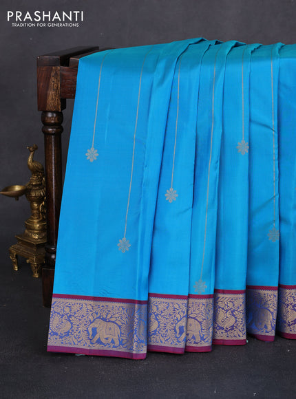 Pure kanchipuram silk saree cs blue and dual shade of maroon with allover zari weaves and rich zari woven border