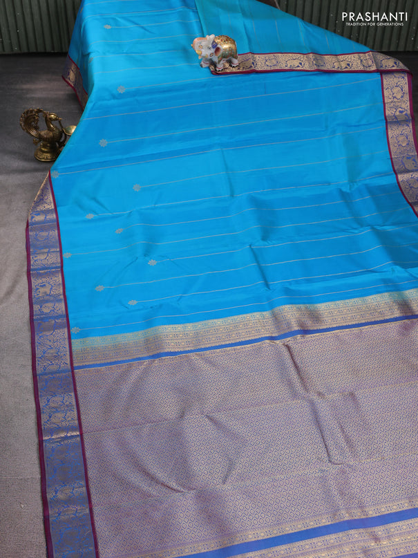 Pure kanchipuram silk saree cs blue and dual shade of maroon with allover zari weaves and rich zari woven border