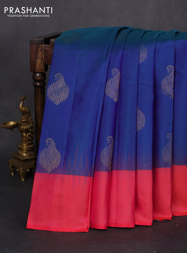 Pure kanchipuram silk saree dual shade of blue and dual shade of pinkish orange with zari woven buttas and zari woven border