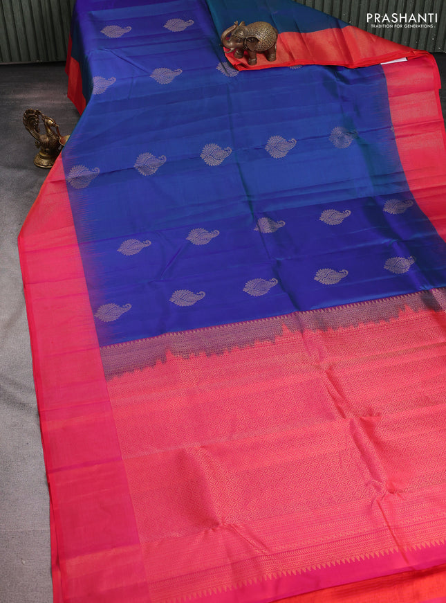 Pure kanchipuram silk saree dual shade of blue and dual shade of pinkish orange with zari woven buttas and zari woven border