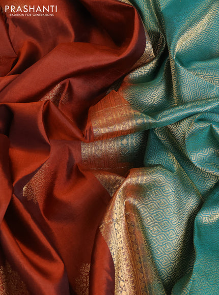 Pure kanchipuram silk saree rust shade and teal green with zari woven buttas and temple design woven border