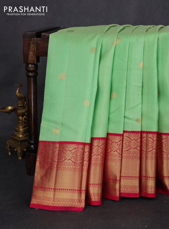 Pure kanchipuram silk saree pista green and pink with zari woven buttas and rich zari woven korvai border