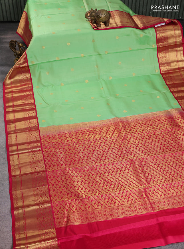 Pure kanchipuram silk saree pista green and pink with zari woven buttas and rich zari woven korvai border