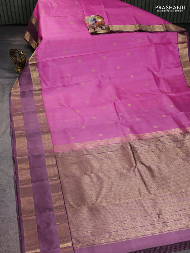Pure kanchipuram silk saree light pink and pastel pink with zari woven buttas and long rettapet zari woven border