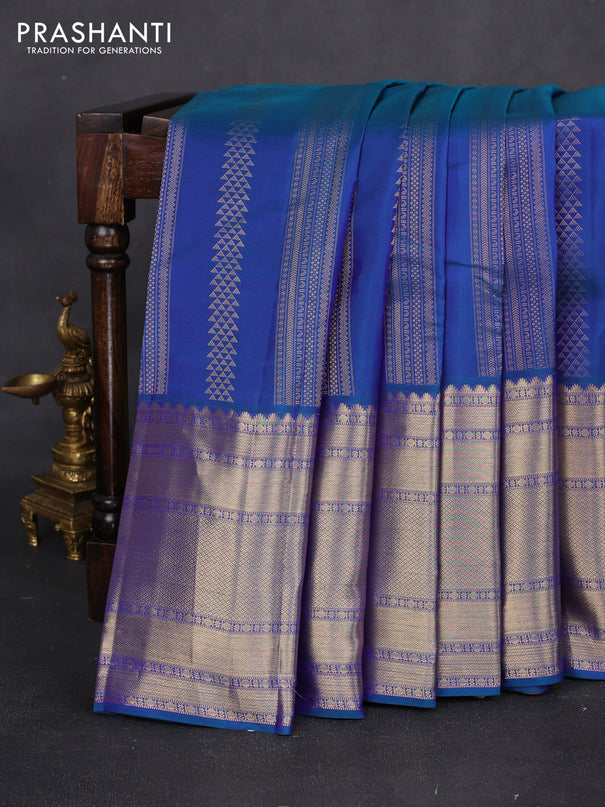Pure kanchipuram silk saree dual shade of bluish green and pastel pink with allover zari weaves and long rich zari woven border