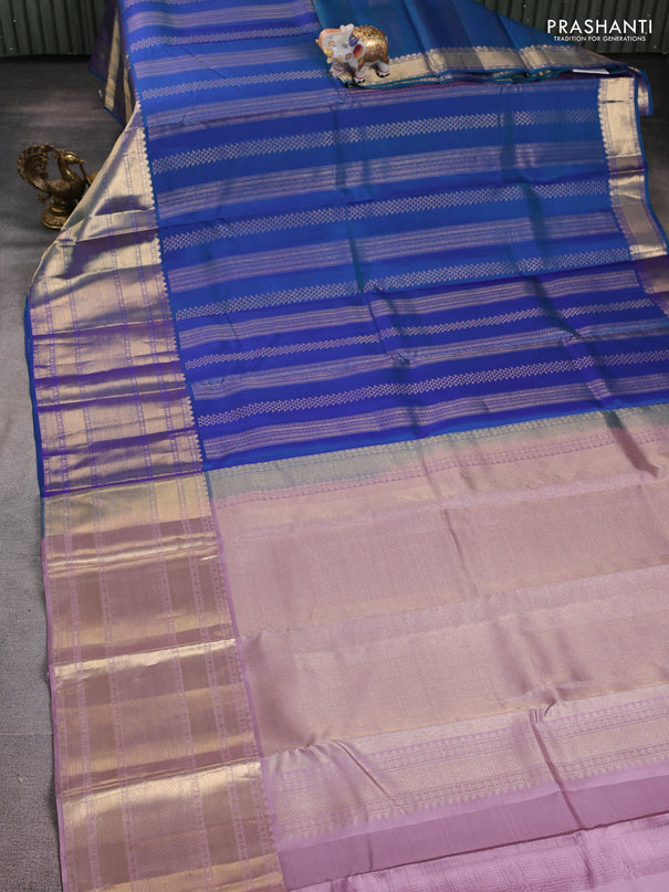 Pure kanchipuram silk saree dual shade of bluish green and pastel pink with allover zari weaves and long rich zari woven border