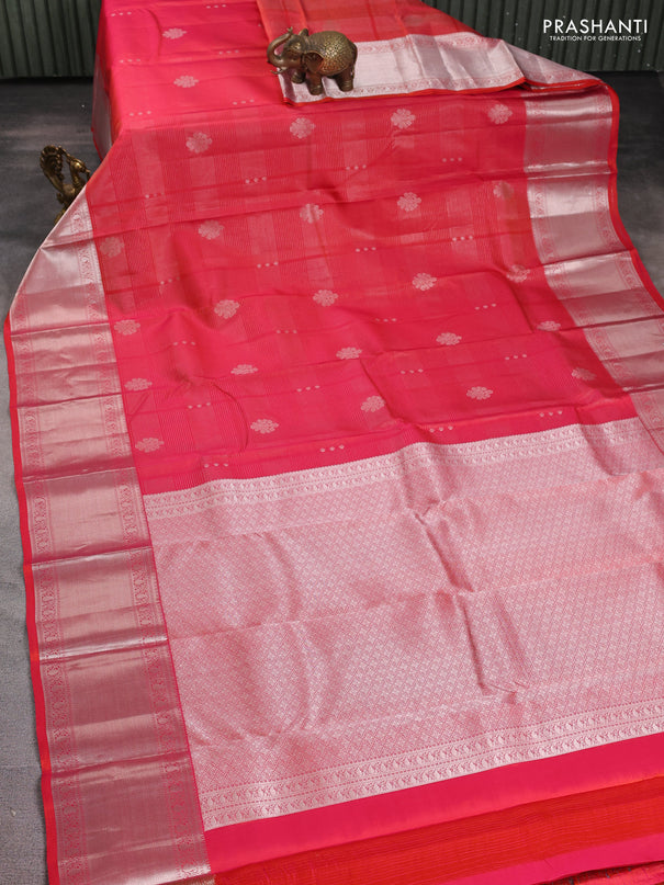 Pure kanchipuram silk saree dual shade of pinkish orange with allover silver zari weaves & buttas and long silver zari woven border