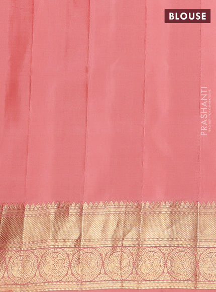 Pure gadwal silk saree dual shade of bluish green and peach shade with zari woven annam buttas and temple design zari woven border