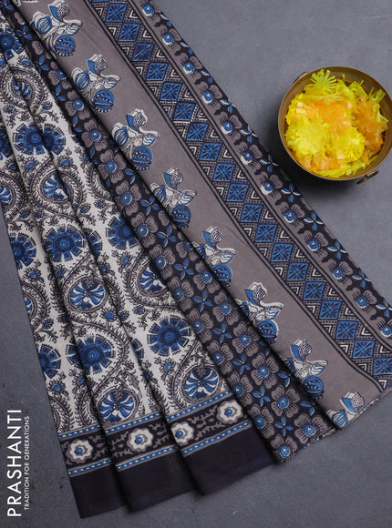 Jaipur cotton saree peacock blue and black with allover prints and printed border
