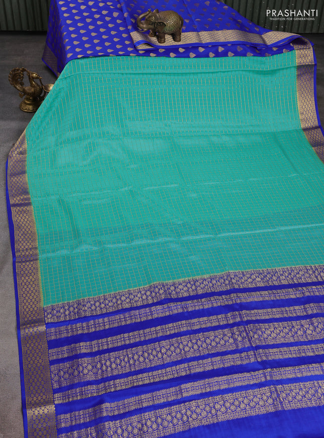 Pure mysore silk partly saree teal blue and blue with allover zari woven checked pattern and zari woven border