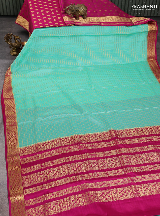 Pure mysore silk partly saree teal green shade and pink with allover zari woven checked pattern and zari woven border