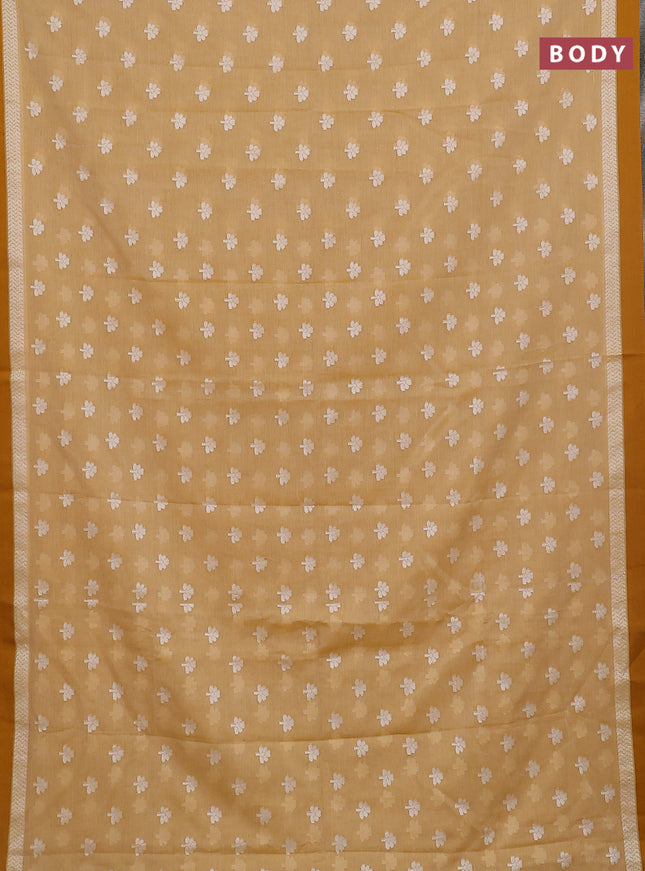 Khadi cotton saree sandal and dark mustard with allover floral thread woven buttas and thread woven border