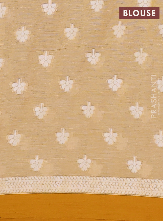 Khadi cotton saree sandal and dark mustard with allover floral thread woven buttas and thread woven border