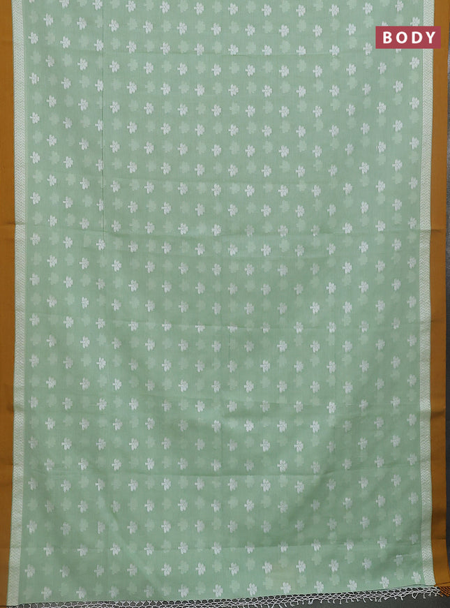 Khadi cotton saree pista green and dark mustard with allover floral thread woven buttas and thread woven border