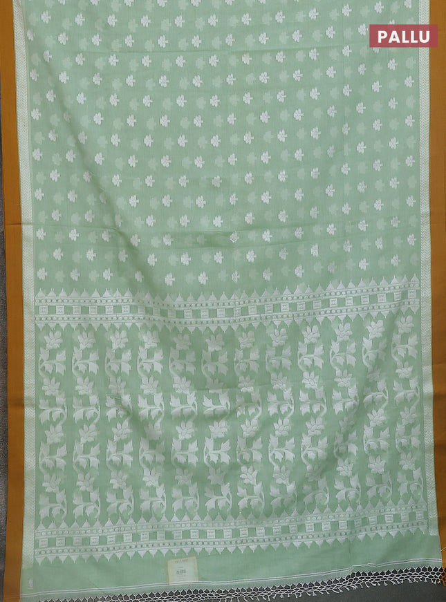 Khadi cotton saree pista green and dark mustard with allover floral thread woven buttas and thread woven border