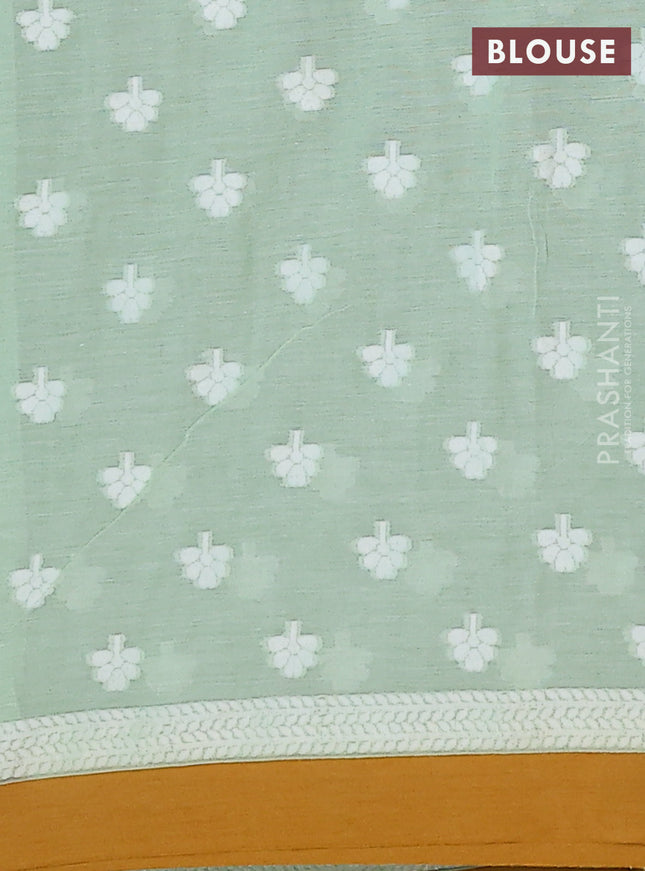 Khadi cotton saree pista green and dark mustard with allover floral thread woven buttas and thread woven border