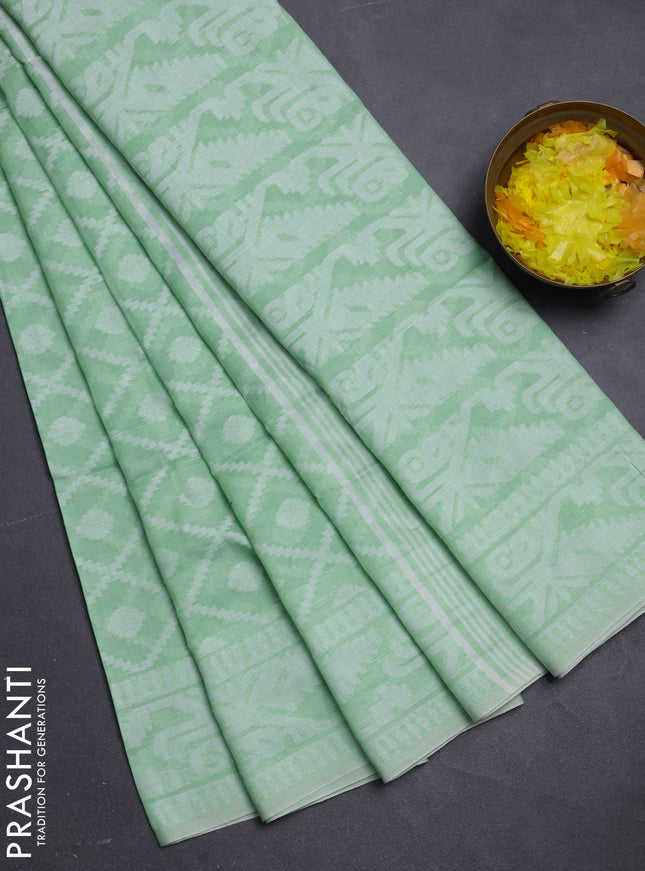 Khadi cotton saree pista green with allover thread woven buttas and thread woven border