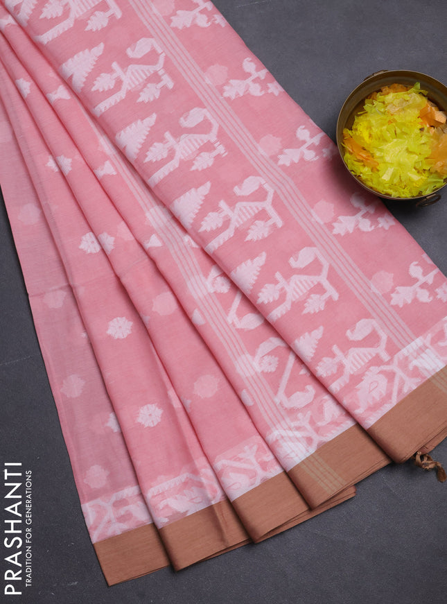 Khadi cotton saree peach shade and sandal with allover thread woven buttas and thread woven border