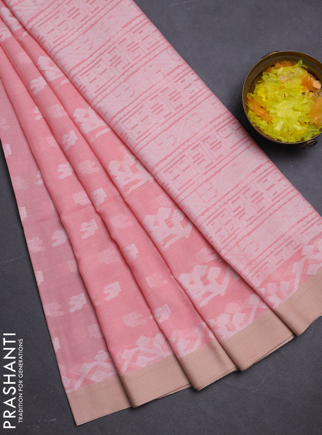 Khadi cotton saree peach shade and sandal with allover thread woven buttas and thread woven border