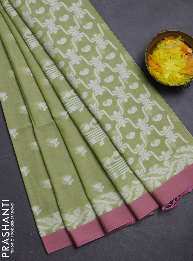 Khadi cotton saree pista green and pastel pink with allover floral thread woven buttas and thread woven border