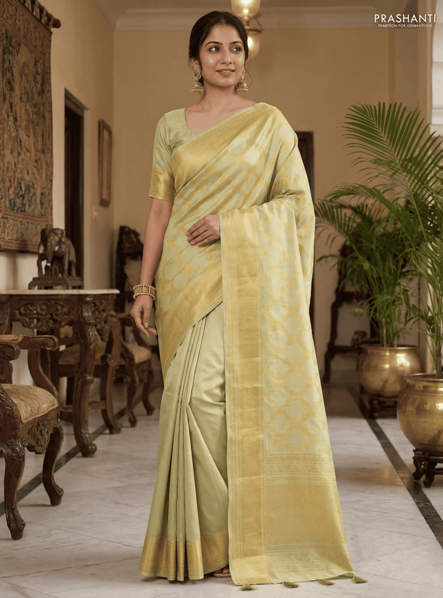Pure kanchipuram silk saree mild pista green with allover zari weaves and rich zari woven border