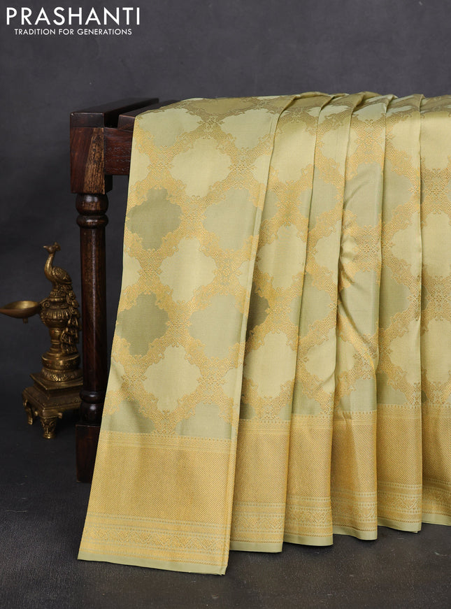 Pure kanchipuram silk saree mild pista green with allover zari weaves and rich zari woven border