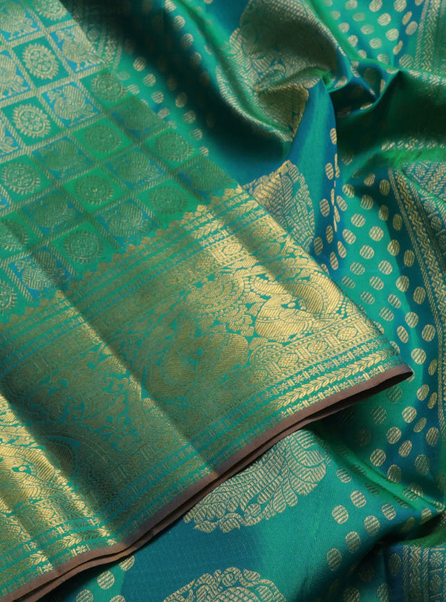 Pure kanchipuram silk saree teal green with allover zari woven brocade weaves and rich zari woven border