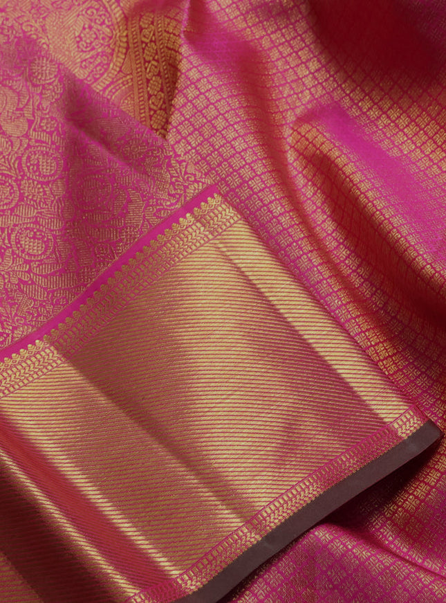 Pure kanchipuram silk saree pink and dual shade of green with allover zari woven brocade weaves and rich zari woven border