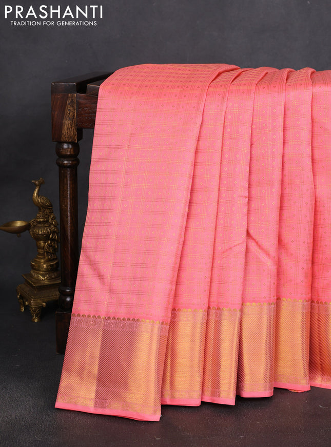Pure kanchipuram silk saree peach pink with allover zari checks & buttas and rich zari woven border
