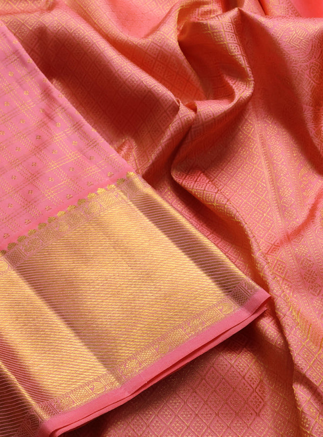Pure kanchipuram silk saree peach pink with allover zari checks & buttas and rich zari woven border