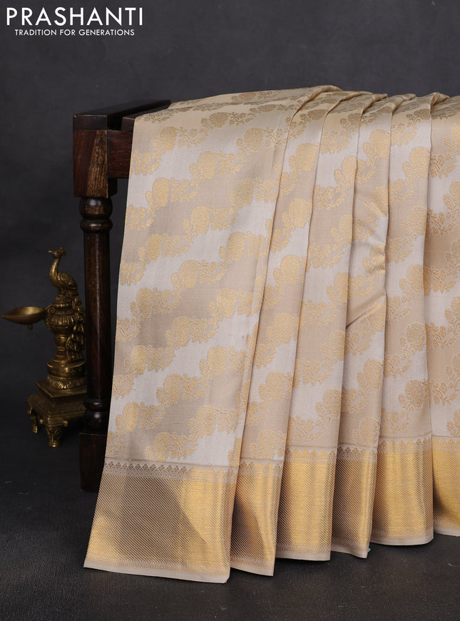 Pure kanchipuram silk saree cream and beige with allover zari woven brocade weaves and rich zari woven border