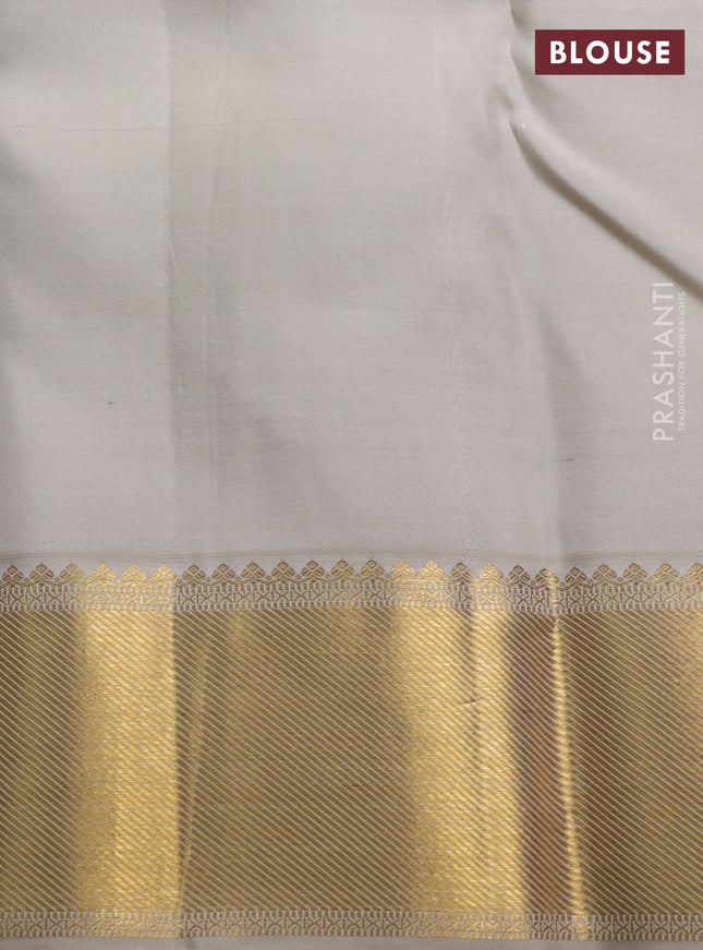Pure kanchipuram silk saree cream and beige with allover zari woven brocade weaves and rich zari woven border