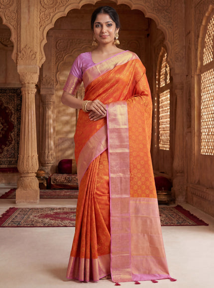 Pure kanchipuram silk saree orange and mild lavender with allover zari woven brocade weaves and rich zari woven border