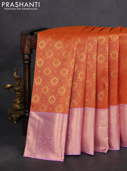 Pure kanchipuram silk saree orange and mild lavender with allover zari woven brocade weaves and rich zari woven border