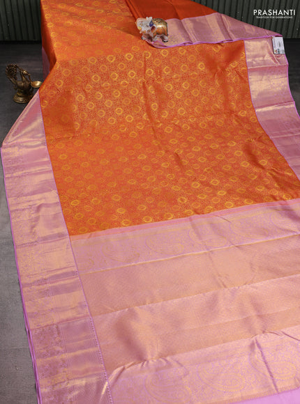 Pure kanchipuram silk saree orange and mild lavender with allover zari woven brocade weaves and rich zari woven border