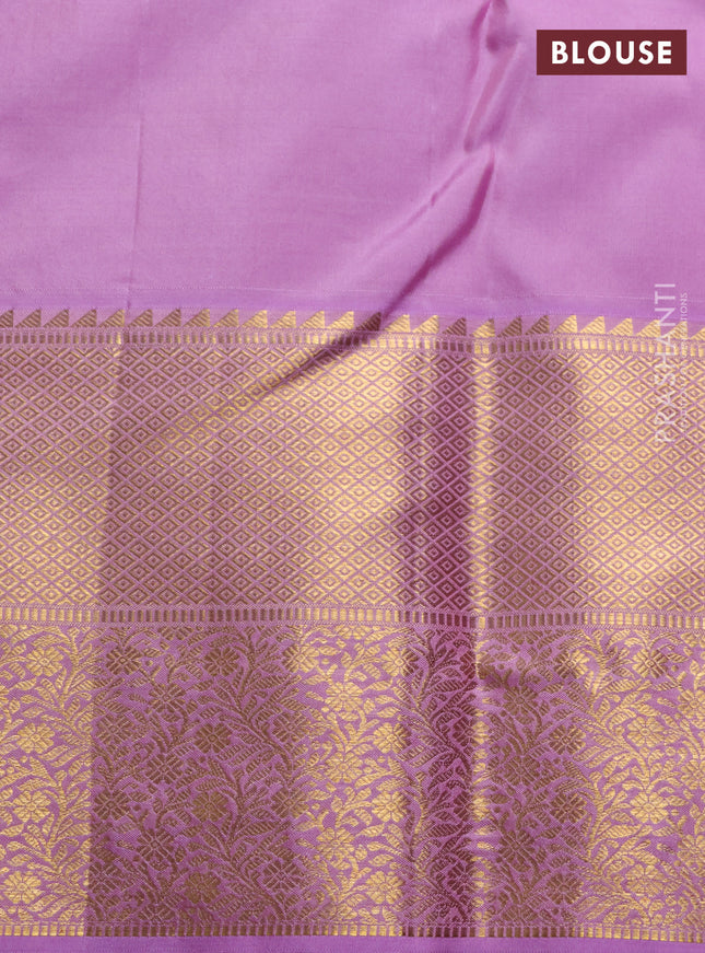 Pure kanchipuram silk saree orange and mild lavender with allover zari woven brocade weaves and rich zari woven border