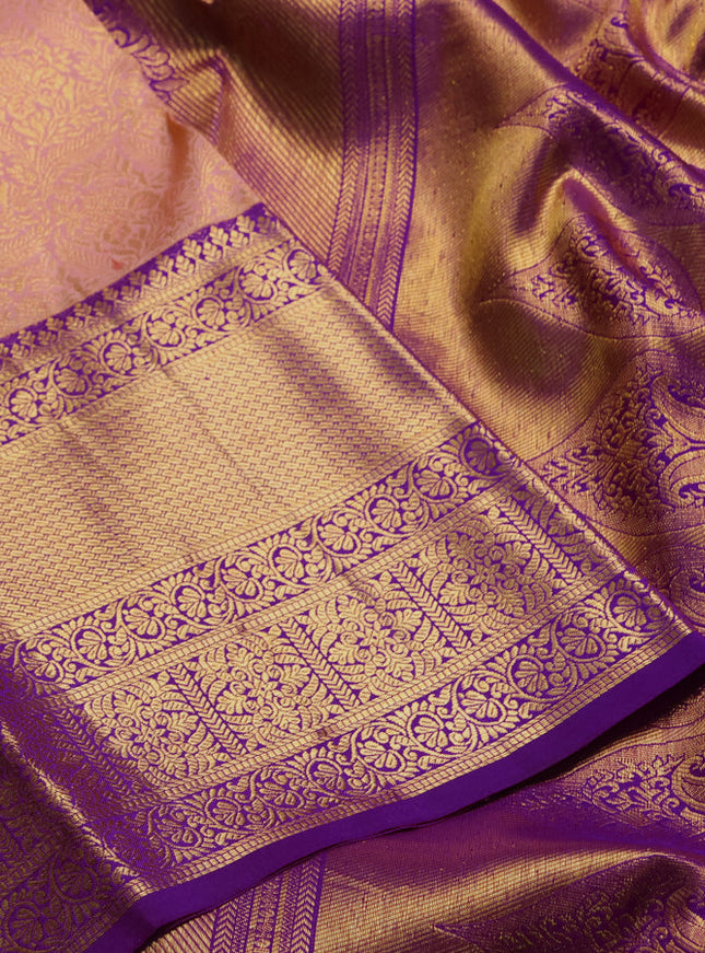 Pure kanchipuram silk saree peach shade and purple with allover zari woven brocade weaves and long rich zari woven border